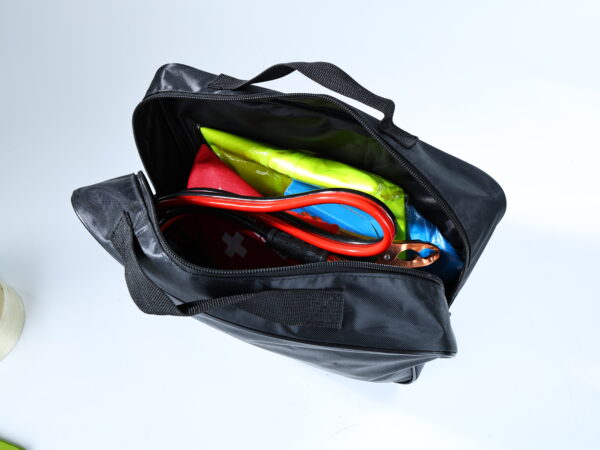 Portable roadside emergency kit bag with bold white text and carrying handle.