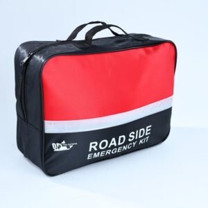Close-up of a roadside emergency kit bag, featuring a red and black design with a reflective strip.