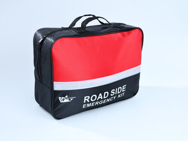 Close-up of a roadside emergency kit bag, featuring a red and black design with a reflective strip.